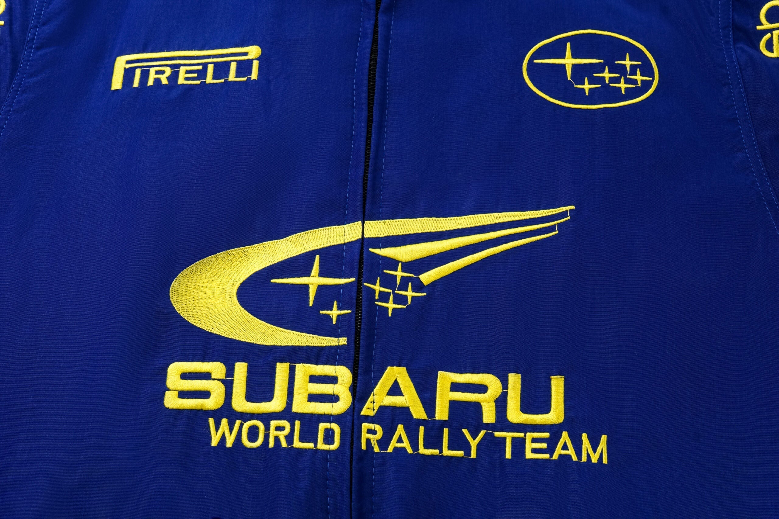 Chaqueta del Equipo de Rally Mundial Subaru – Abrigo con cremallera azul y amarillo Motorsport